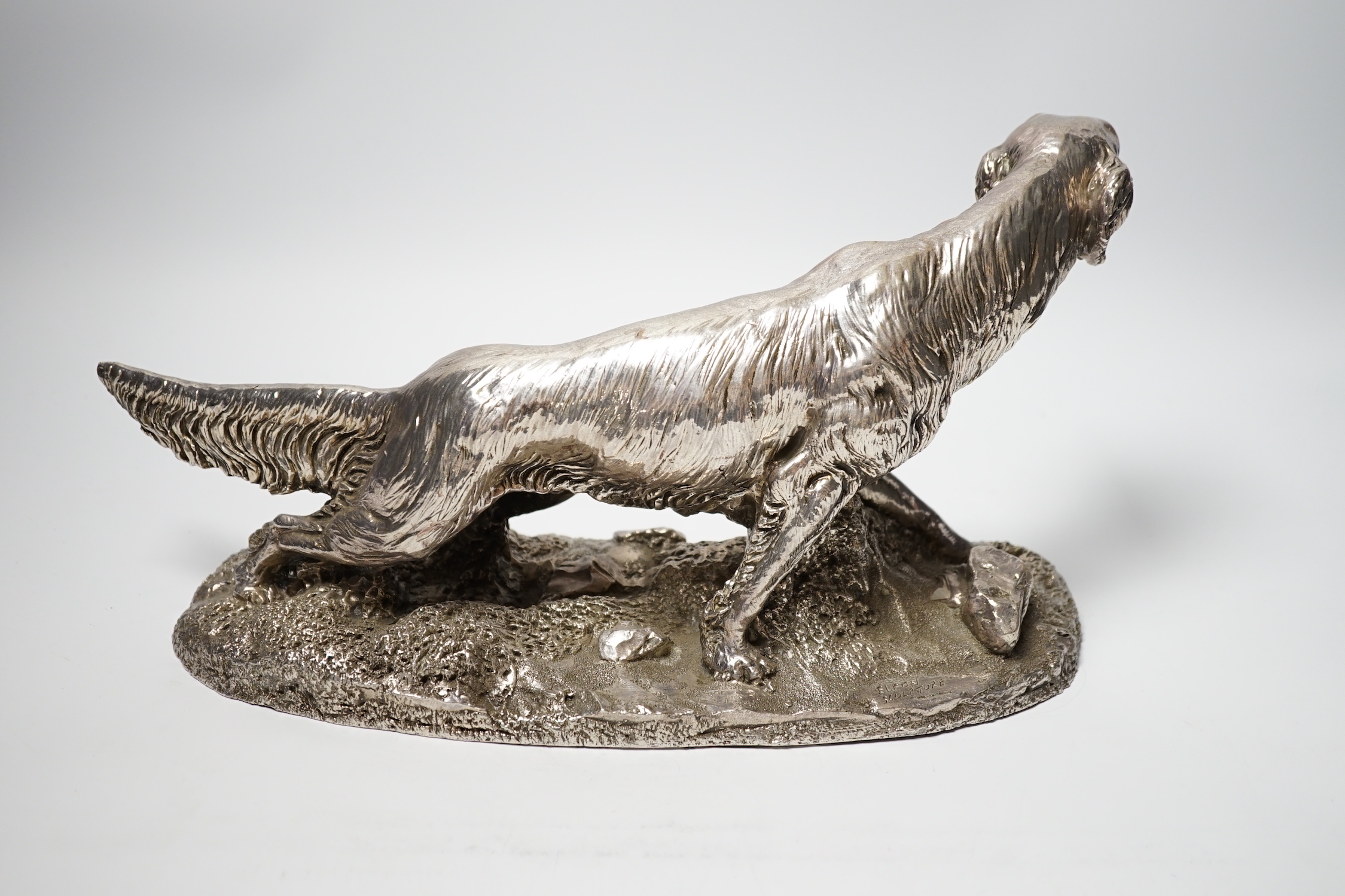 A modern filled silver model of an Irish Setter, by Camelot Silver Ltd, after Giuseppe Griecco?, Sheffield, 1998, length 31cm.